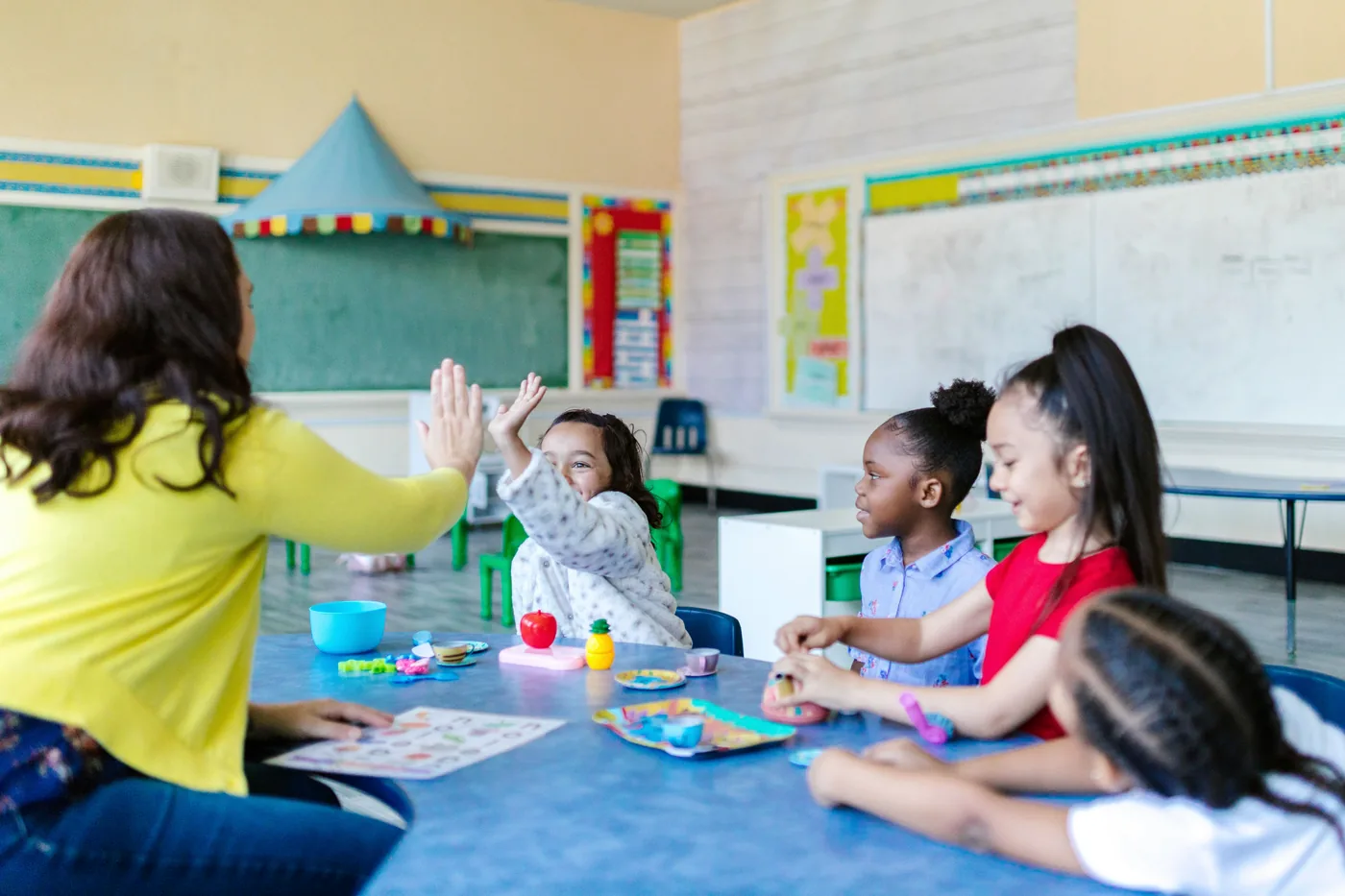 Children enjoying creative play-based learning
